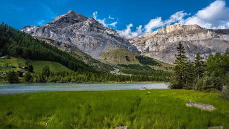 Majestic Mountain Landscape Under a Clear Blue Sky wallpaper