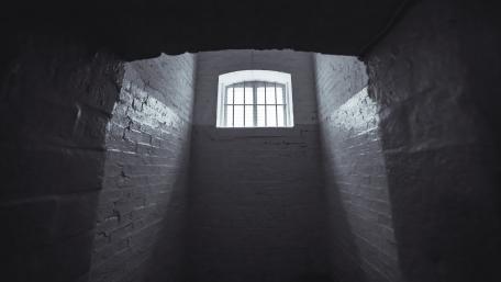 Darkness of Confinement in a Prison Cell wallpaper