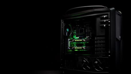 High-Tech Gaming Rig on Dark Background wallpaper