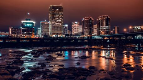 Stunning Night Cityscape Reflected in Water wallpaper