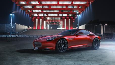 Sleek Red Supercar at Nighttime Marvel wallpaper