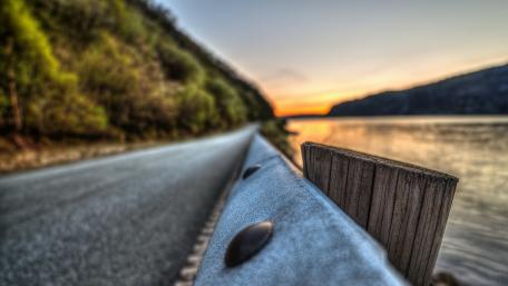 Serene Road Along the River Bend wallpaper