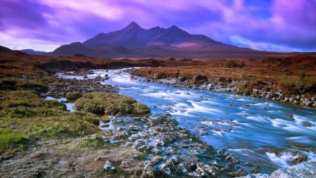 Majestic Mountain Serenity over a Flowing River wallpaper