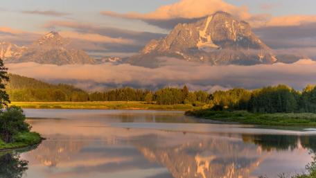 Majestic Mountains and Serene River Reflection wallpaper