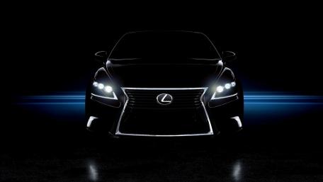 Sleek Lexus Headlamp in Dark Setting wallpaper
