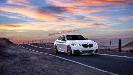 BMW at Dusk Highway Drive wallpaper