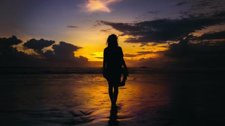 Serene Sunset Silhouette by the Shore wallpaper