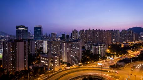 Stunning Cityscape at Dusk with Skyscrapers and Twinkling Lights wallpaper