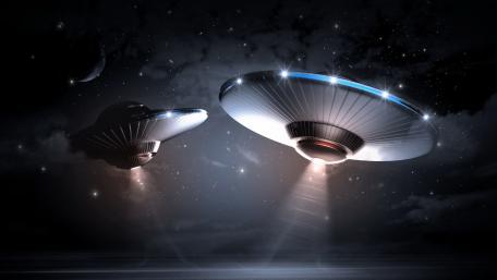 Futuristic Saucers in the Cosmic Night Sky wallpaper