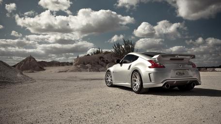 Sleek Nissan 370Z Nismo on Open Terrain wallpaper