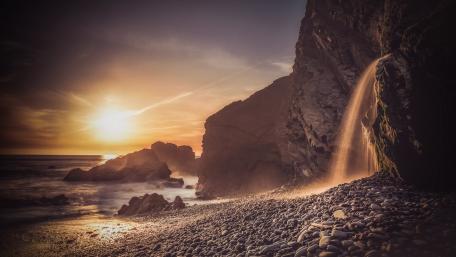 Serene Sunset by the Waterfall wallpaper