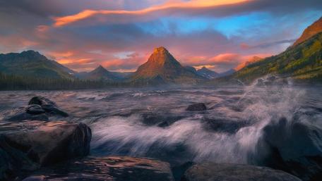 Majestic River in Vibrant Sunset Glow wallpaper