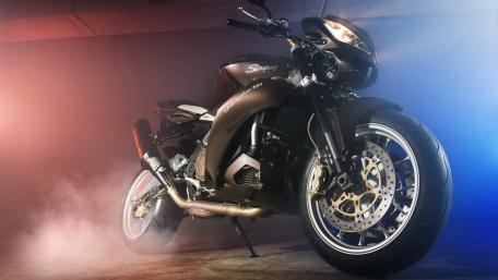 Sleek and Powerful Motorcycle in Motion wallpaper