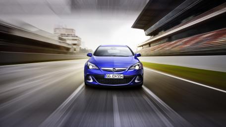 Dynamic Opel Astra in Motion Wallpaper wallpaper