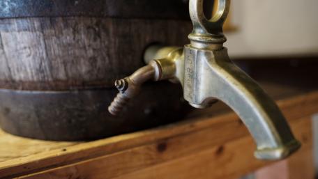 Rustic Wooden Keg with Brass Tap wallpaper