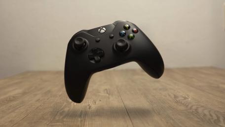 Levitating Xbox Controller in Serene Backdrop wallpaper