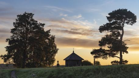 Serene Dawn at the Woodland Chapel wallpaper