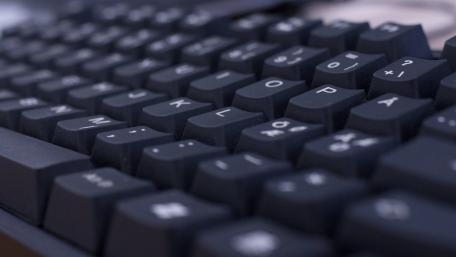 Sleek Close-Up of a Computer Keyboard in 4K Resolution wallpaper