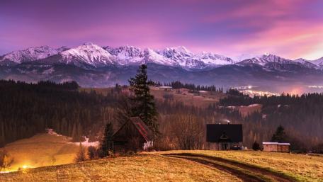 Majestic Alps at Dusk Surrounded by Tranquil Beauty wallpaper