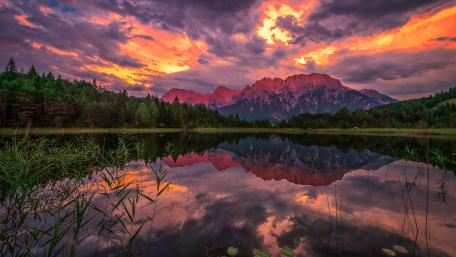 Stunning Sunset Reflection Over Mountain Lake wallpaper