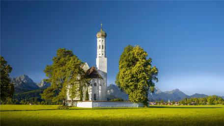 Pilgrimage Church of St. Coloman and the Neuschwanstein Castle on the background wallpaper