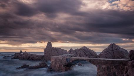 Majestic Cliffs Embraced by the Sea wallpaper