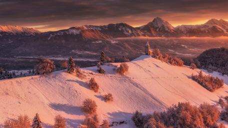 Church of St. Primus and Felician in the distance wallpaper