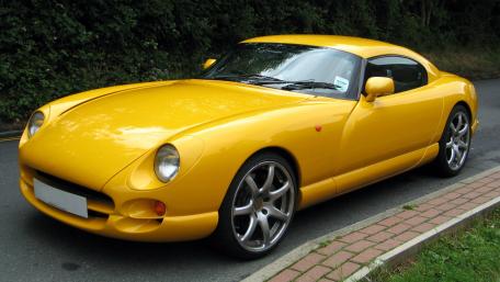 Vibrant Yellow Sports Car Wallpaper wallpaper