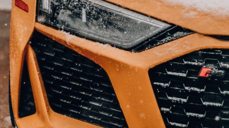 Dynamic Headlamp Glimpse of a Sporty Car wallpaper