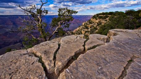 Majestic Rocky Outcrop Under Expansive Sky wallpaper