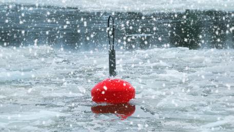 Red Buoy in a Snowy Landscape wallpaper