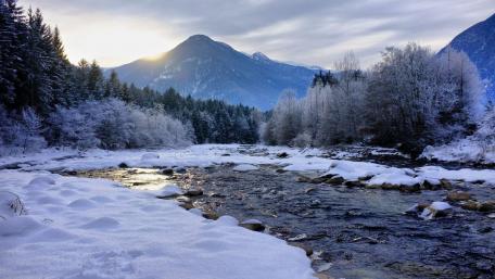 Serene Winter Landscape by the River wallpaper
