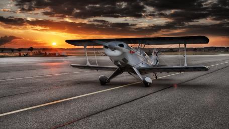 Sunset Takeoff on the Runway in 4K Quality wallpaper