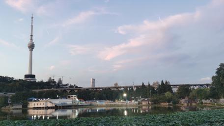 City Skyline at Dusk with Reflections in Water wallpaper