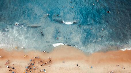 Aerial Serenity Over Crystal Clear Waters wallpaper