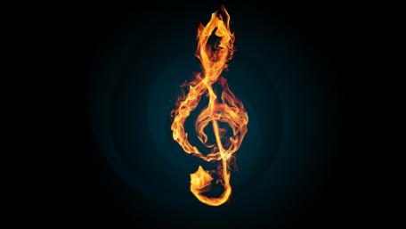 Fiery Melody: The Burning Treble Clef in Harmony wallpaper