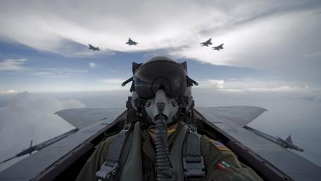 Sky-High Valor Above the Clouds wallpaper