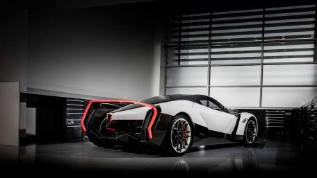 Sleek Vanda Supercar in Modern Garage Setting wallpaper