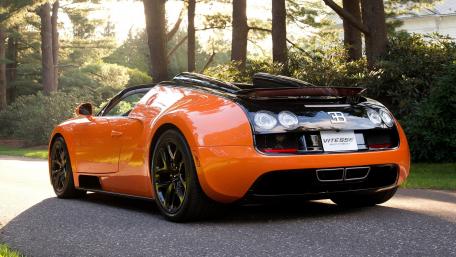 Ultimate Dream Car in Stunning Orange Finish wallpaper