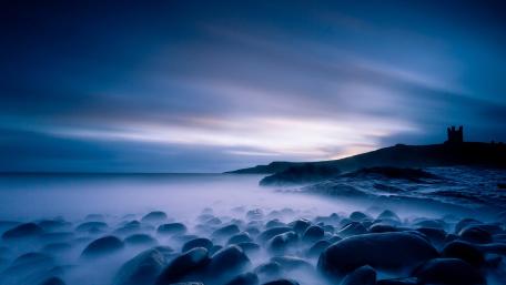 Dusk over Misty Sea Stones wallpaper