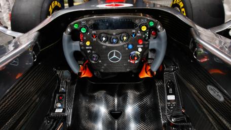 Steering Into Speed: Formula 1 Cockpit Close-Up wallpaper