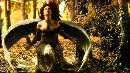 Enchanting Angel in Dreamy Forest Atmosphere wallpaper