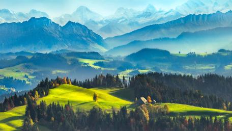 Serene Mountain Retreat in Nature's Embrace wallpaper