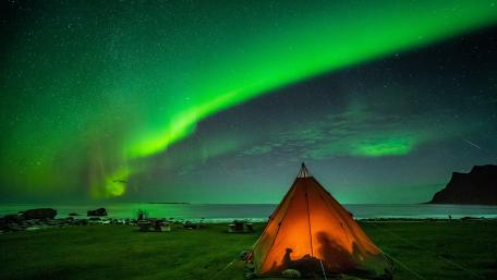 Enchanting Aurora Lights over Camping Tent wallpaper