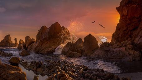 Serene Sunset Over Cliffs by the Sea wallpaper