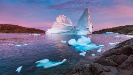 Majestic Iceberg Reflecting Serenity in Nature wallpaper