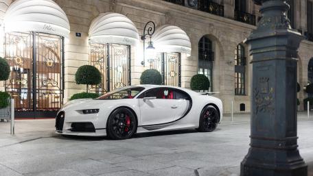 Ultimate Luxury of the Bugatti Chiron on Parisian Streets wallpaper