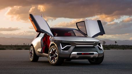 Futuristic Kia Concept Car Design with Winged Doors wallpaper