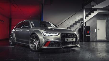 Sleek Audi A6 in Modern Garage Setting wallpaper