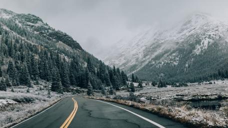 Mountain Road in Winter Wonderland wallpaper